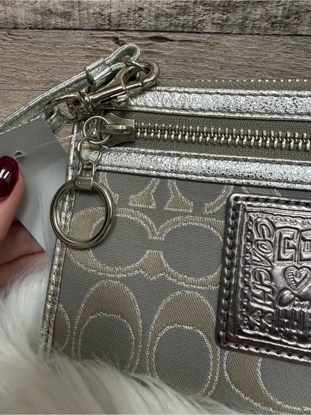 Coach wristlet silver
